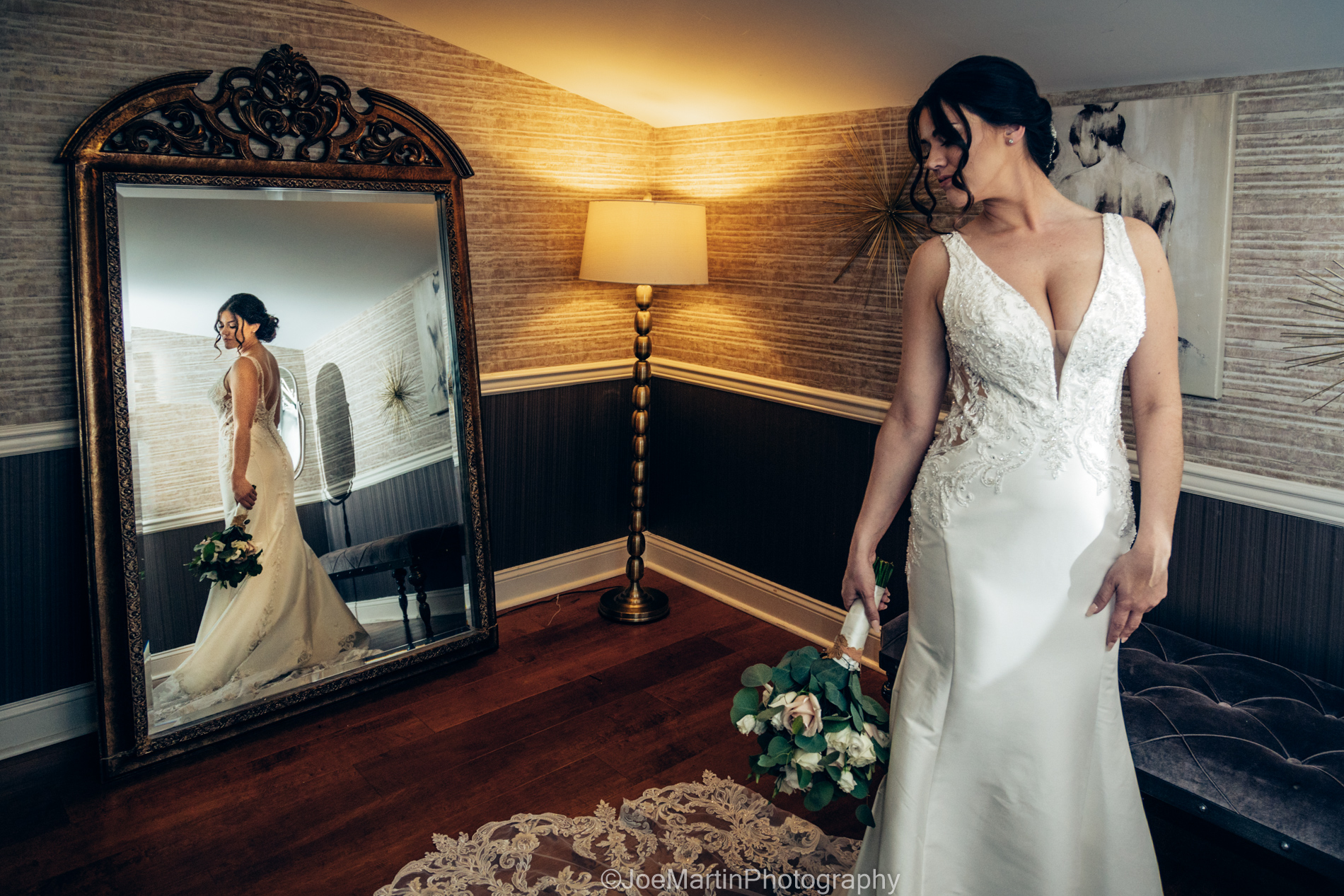 Bride in mirror with flowers 